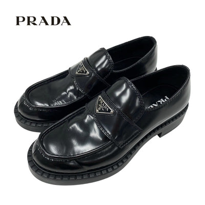 プラダ PRADA チョコレート ローファー 革靴 靴 シューズ レザー ブラック シルバー トライアングルロゴ メンズ