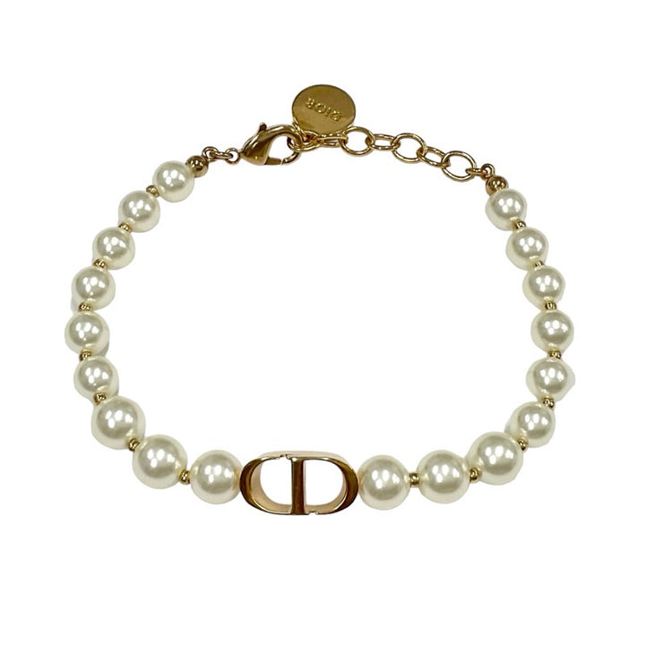 Christian Dior ゴールド マルチカラーストーンバングル 672b39245f0bf.webp