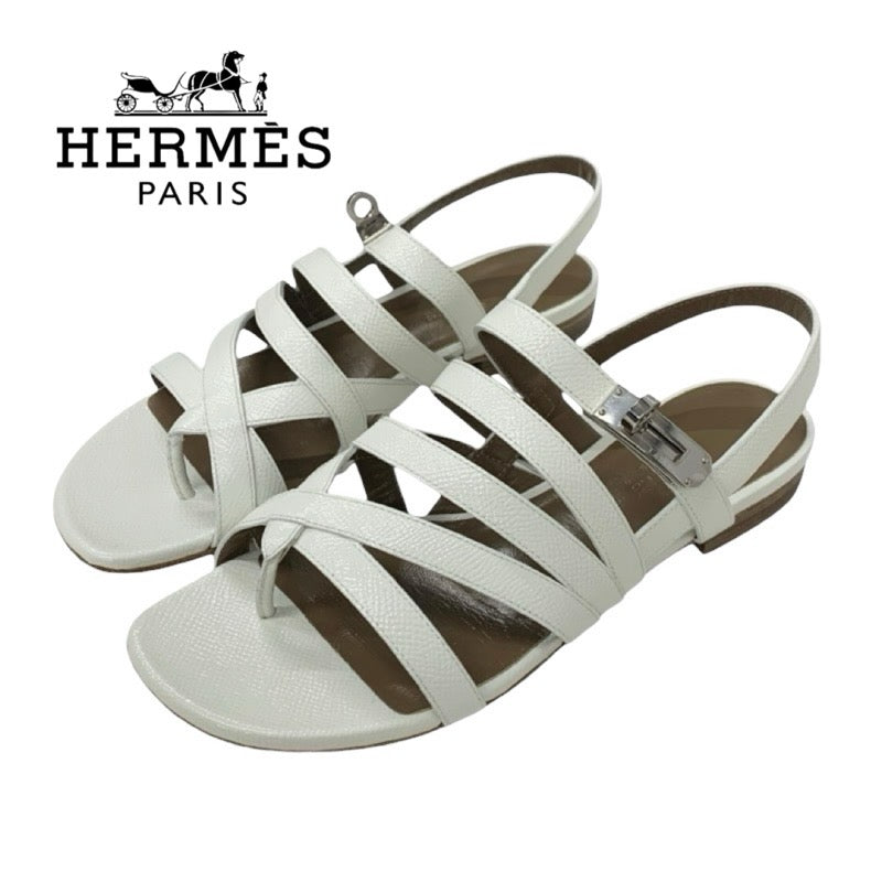 エルメス HERMES サンダル 靴 シューズ レザー ホワイト 白 シルバー トング フラット ケリー金具 ストラップ