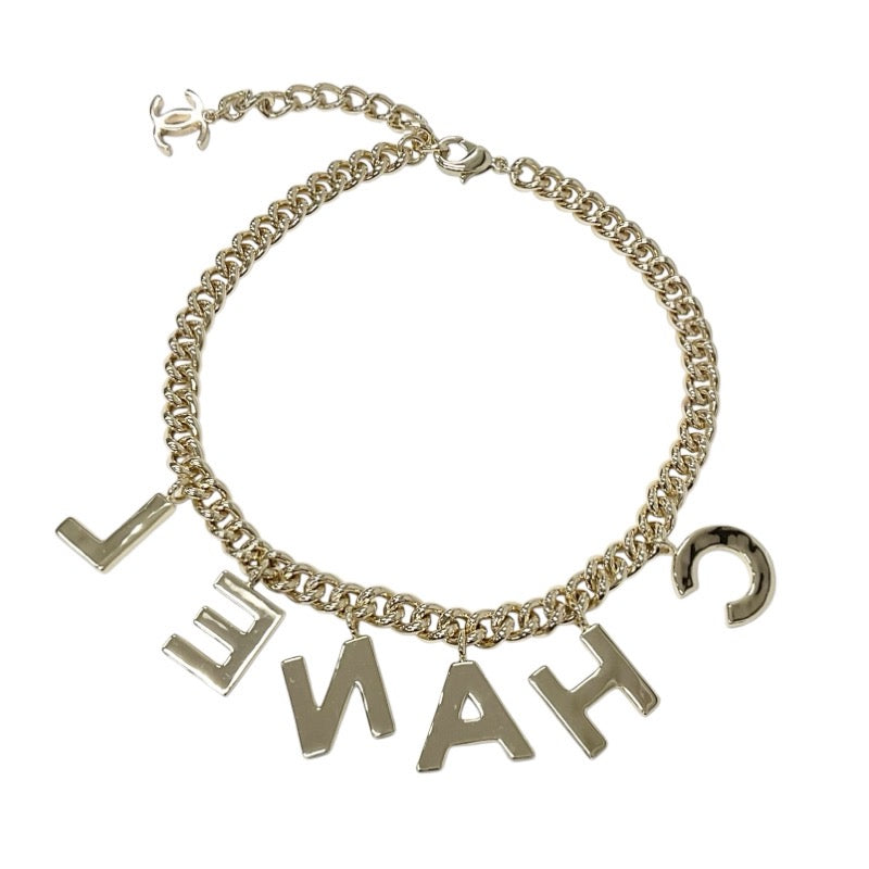 シャネル CHANEL ネックレス ペンダント チョーカー ゴールド ブラック ホワイト ロゴ ココマーク