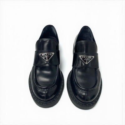 プラダ PRADA チョコレート ローファー 革靴 靴 シューズ レザー ブラック 黒 トライアングルロゴ