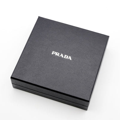 プラダ PRADA ヘアアクセサリー ブラック ゴールド トライアングルロゴ バレッタ リボン Re-Nylon ヘアクリップ