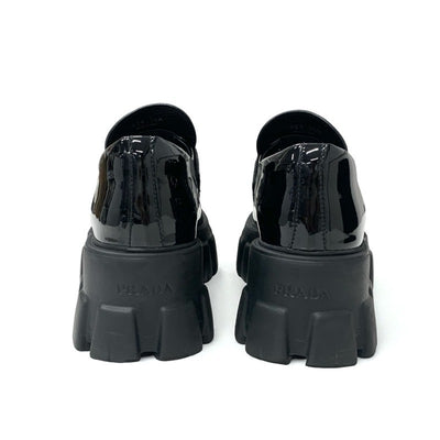 プラダ PRADA モノリス ローファー 革靴 靴 シューズ パテント ブラック 黒 シルバー プラットフォーム トライアングルロゴ