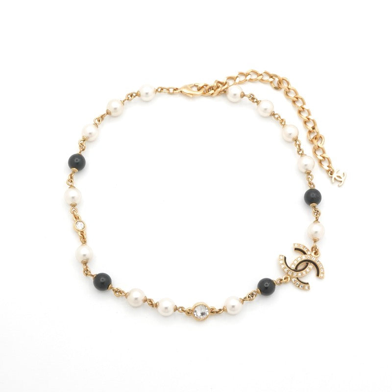 シャネル CHANEL ネックレス ペンダント チョーカー ゴールド ブラック ココマーク ラインストーン