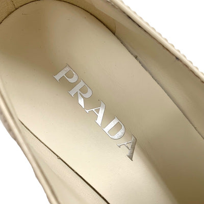 プラダ PRADA チョコレート ローファー 革靴 靴 シューズ パテント アイボリー 未使用 トライアングルロゴ